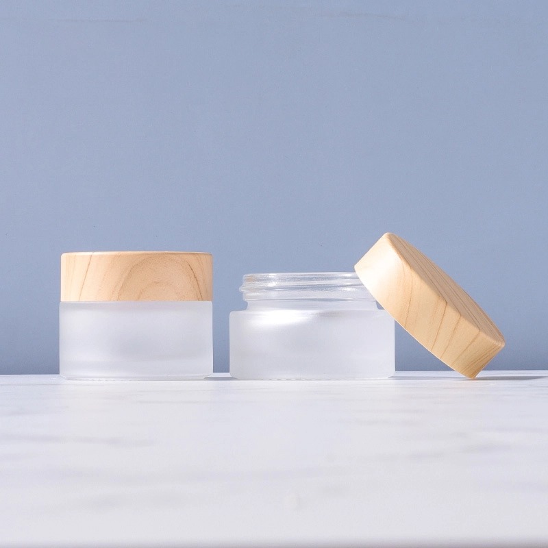 frosted glass cream bottle on display-3